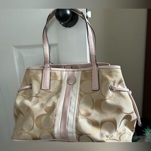 Beige and pink coach purse